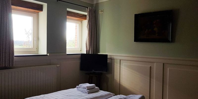 Slaapkamer in Bed And Breakfast Auberge De Smockelaer Slenaken