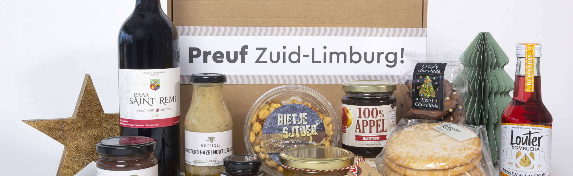 Diverse producten uit de regio Zuid-Limburg, gepresenteerd als cadeautje voor tijdens de feestdagen.